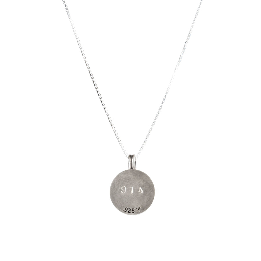 back of pendant with numbers on white background